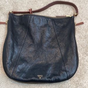 Fossil leather purse with zip bottom.